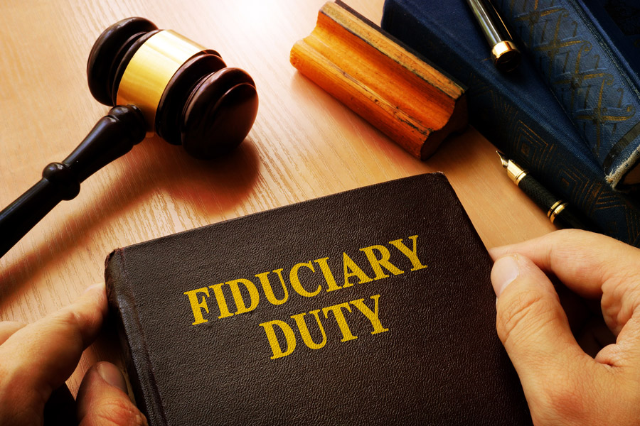 Fiduciary Duty book next to a gavel