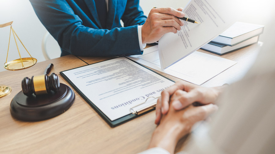 Older woman consulting with a lawyer